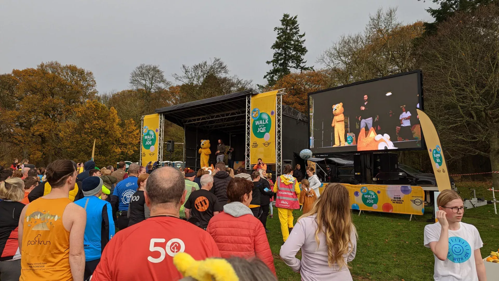 Branded EEH trailer stage at a charity fundraising event